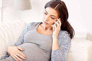 Pregnant woman on the phone